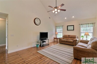 Family Room ~ Cathedral Ceiling ~ Laminate Wood Fl