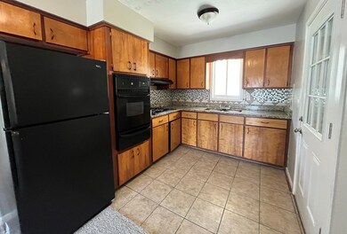 Kitchen features granite counters