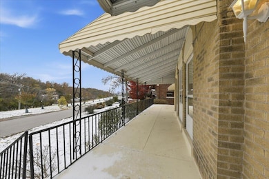 05-Front Porch w_View of Cincinnati