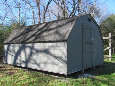 Not to be overlooked, this is a very nice detached storage building that comes with the property at no additional cost.