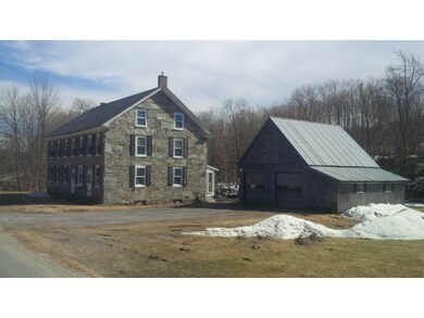 Rear of residence & garage