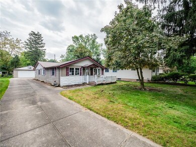 View of front of property featuring garage and a f