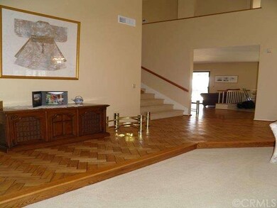 CUSTOM WOOD FLOORING CONTINUES INTO FAMILY ROOM!