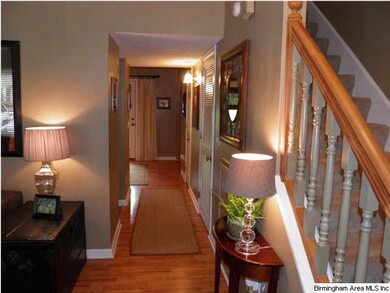 View from front door toward kitchen/dining/den