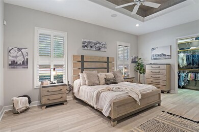 HUGE master suite with his and hers closets.