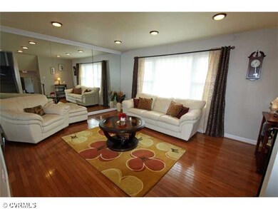 Living Room - Hardwood floors and recess lighting.