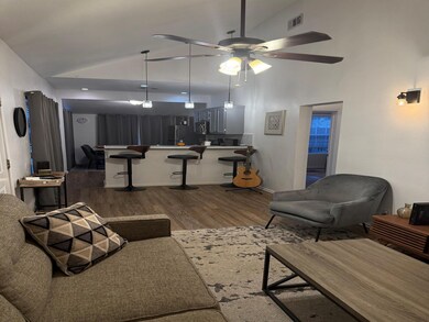 Living room featuring dark hardwood / wood-style f
