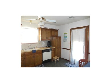 Pantry, eat-in area, and access to the deck