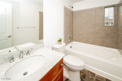 Full bathroom featuring tiled shower / bath combo,