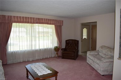 Spacious living and dining rooms with lots of natu