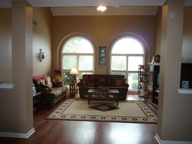 Full View of Living Room, Wood Floors, Vaulted Cei