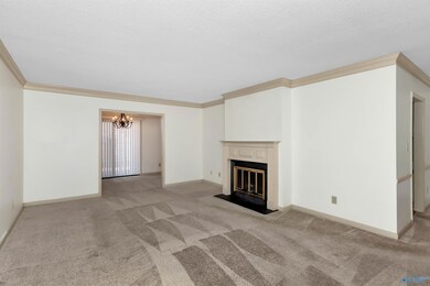 Spacious living room with beautify crown molding a
