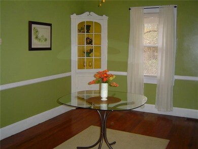 Cheerful dining room has a beautiful built-in cabi