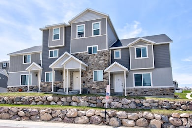 View of front of house featuring stone siding