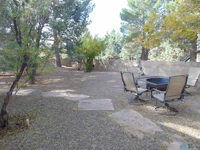 View of fenced backyard