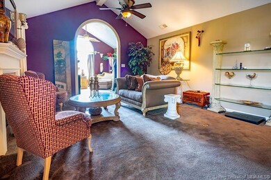 Large living room with adjoining sun room/music ro