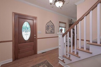 FOYER WITH STAINGLASS FRONT DOOR
