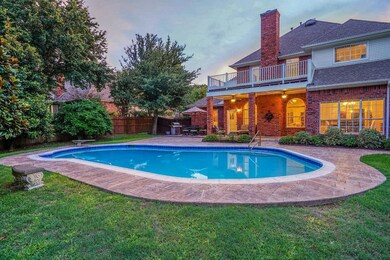 The pool is the main attraction in this backyard o
