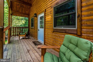 122 Honey Locust Ln, Great Cacapon, WV 25422 - photo 3