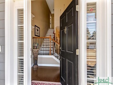 Spacious and Gracious Entry Foyer, rich wood floor