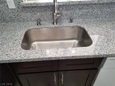 New granite and a under mounted sink.New cabinets