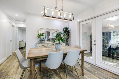 Dining space featuring light wood finished floors,
