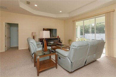 Living Room with Tray Ceiling