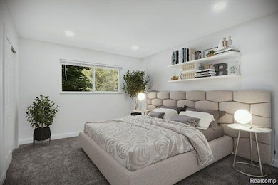 Carpeted bedroom featuring recessed lighting and a closet