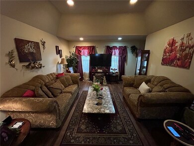 Living room featuring wood finished floors, recess