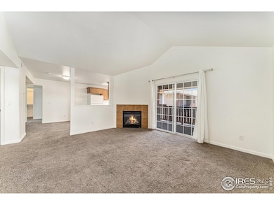 Living Room w/ Gas Fireplace & Access to Patio Area