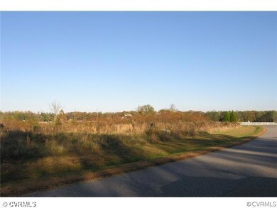Exterior Front - Photo of lot as you look back down to the Entrance Way of the subdivision.