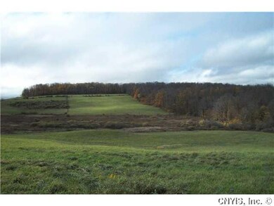 Land/Lot. The south property line is the tree line