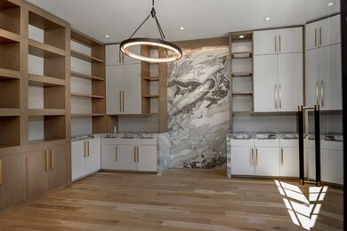 This gorgeous study with soft close cabinets and D