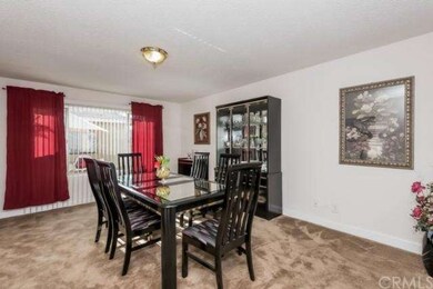 Dining room with slider to private side patio