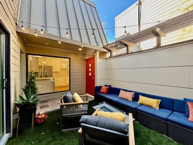 View of patio with outdoor lounge area