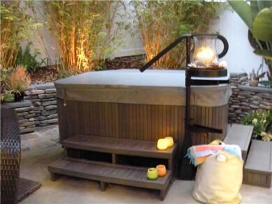 Jacuzzi spa holds 4 adults comfortably