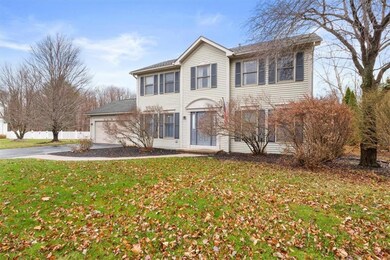 Cul-de- sac location with wooded rear yard