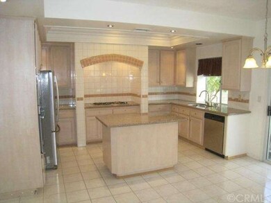 The large kitchen has been upgraded with granite c