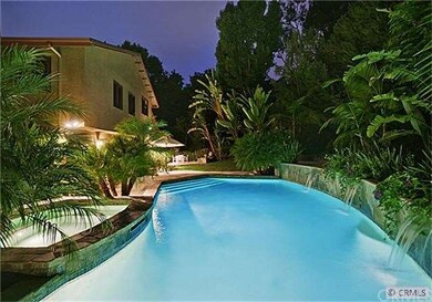 Lush backyard creates a resort-like feel.