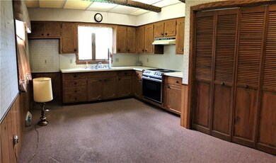 Laundry inside double closet  off 15x11 kitchen.