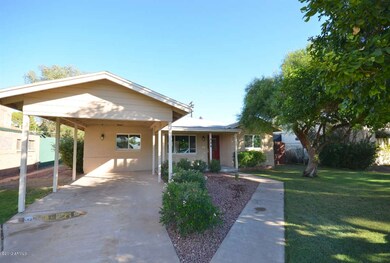Large carport and driveway