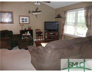 Living Room. Cathedral ceilings in living room.