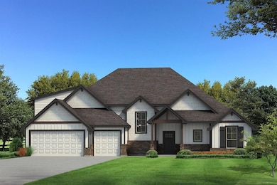 View of front facade with a garage and a front yar
