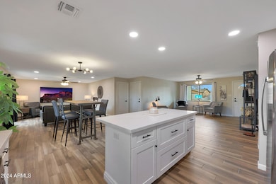 Kitchen overlooking both living areas