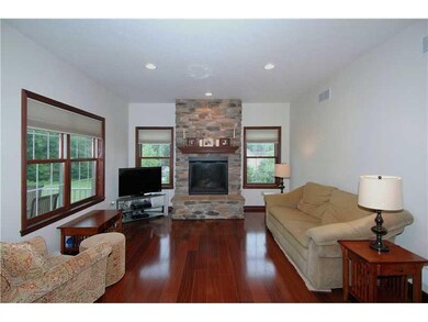 Family Room. Family room features floor to ceiling