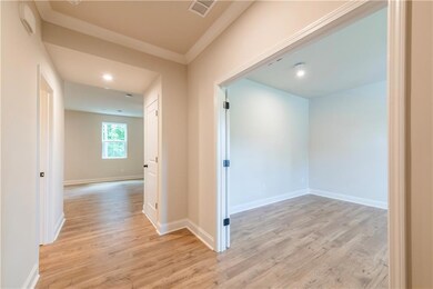 Corridor featuring light hardwood / wood-style flo
