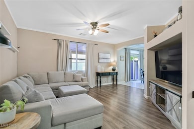 Living room featuring a wealth of natural light, a