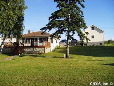 Yard/Garden. The detached garage is the building t
