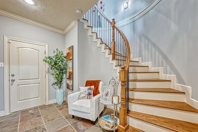 This spiral staircase adds a gorgeous centerpiece