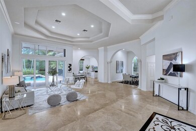 Luxury golf course residence with high coffered ce